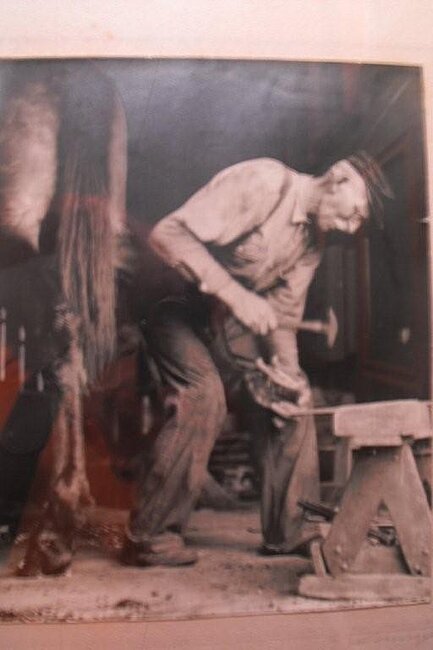 Click image for larger version

Name:	Blacksmith - John Sonney working in his blacksmith shop.jpg
Views:	0
Size:	59.2 KB
ID:	99446